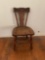 Mid-century caved oak chair