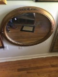 Vintage oval wood and glass mirror