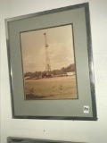 Vintage photo of oil drill rig in frame