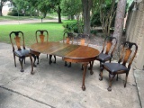 Antique Chippendale dining table and 6 chairs