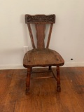 Mid-century caved oak chair