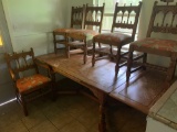 Mid-century dining table with two hidden extensions and chairs