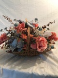 Decorative flowers in basket