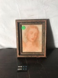 Antique artwork in frame