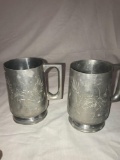 Qty of 2 engraved pewter drinking cups