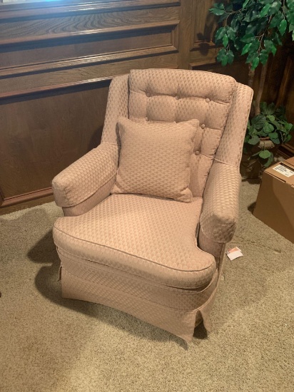 Swivel rocker with cushion