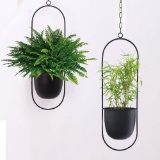 Sinolodo Boho Wall Hanging Planter,Metal Hanging Flower Pots(2pcs-Black Oval) - $42.99 MSRP