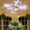 KPCB Tech Store Christmas Tree Topper Snowstorm Projection with Gold Metallic Surface, $15.75