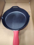 Cast Iron Skillet with Red Silicone Hot Handle Holder