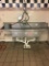 Three bay sink with drainboards and faucet