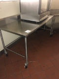 6' Stainless table with backsplash