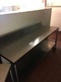 6' Stainless table with backsplash and shelf