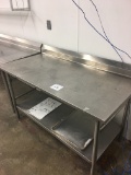 5' Stainless steel table with backsplash and shelf