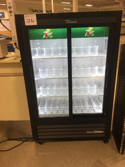 True Glass door checkout cooler