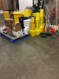 Trash can and cleaning supplies