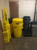 Trash cans, wet floor sign, brooms