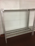(9) Two shelf cooler racks, your bid X 9