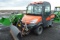 KUBOTA RTV 1100 W/ FRONT BLADE, POWER STEERING, 4WD, DIESEL, HYD DUMP, AIR,