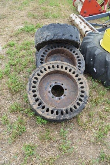 4- solid skid loader tires