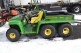 JD 6X4 gator w/ Deisel, manual dumping bed, 1,484 hrs.