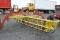 NH 256 roll-a-bar hay rake