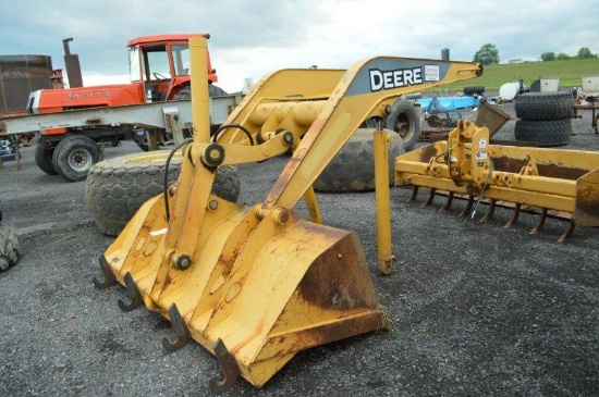 JD front loader for a JD 210 LE