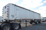 '04 East 40' frameless dump trailer, spread axle, front lift axle , air ride, roll tarp, poly liner,