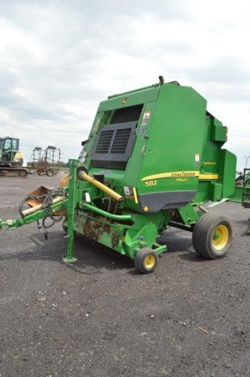 JD 582 silage special roung baler w/ net wrap, roto cut, 540 pto, (has fire damage on right rear pan