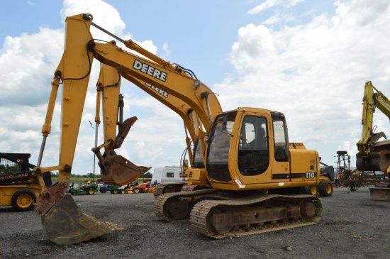 JD 110 excavator w/ cab w/ heat, 8,931 hrs, 24'' tracks, quick att w/ 24'' digging bucket, JD PowerT