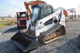 Bobcat T650 skid loader w/ rubber tracks, 4,238 hrs, aux hyd, quick att, foot & hand controls, cab w