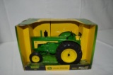 JD Model 830 tractor, die-cast metal, 1/16 scale, new in box