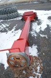 Swing away load auger