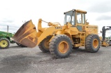 JD 544E wheel loader w/ 8' material bucket w. bolt on cutting edge,  16,921 hrs, 4spd trans w/ rever