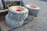 4- Bobcat 12-16.5 tubeless skid loader tires on 8 bolt rims