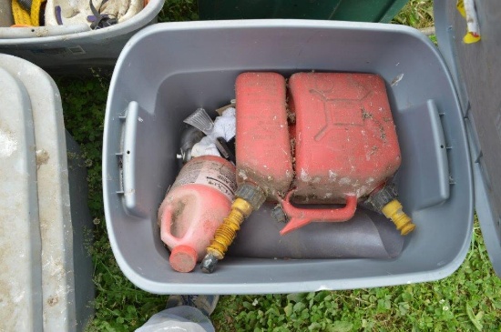 4- Totes of misc: roller blades, helmets, gas cans