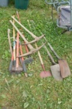 Multiple sledge hammers, ground shovels, picks, & hose