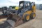 JD 318G skid loader w/ 7,016 hrs, 2 spped, hyd quick attach, aux hyd, 10-16.5 tires  Selling w/ 72