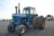 Ford 9700 w/ 5,097 hrs, 8 speed, 2 remotes,540/1000 pto, cab,air, heat, 18.4R38 duals, wheel weights