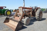 IH 656 tractor w/ IH 2000 loader w/ 7' material bucket, showing 1998 hrs, T/A, 2 remotes, 540 pto, (