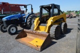 JD 6657 skid loader, w/ 6' material bucket, foot controls, aux hyd, solid rubber tires, (hrs not sho