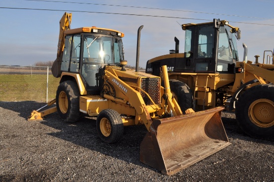 JD 310D backhoe w/ 4,199 origanal hrs, cab, 24" digging bucket, 90" materal bucket, ( very nice)