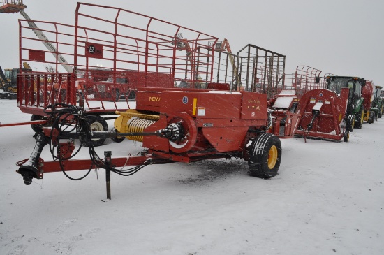 NH 575 small square baler w/ thrower, string tie, hyd hitch (controls in office, new)