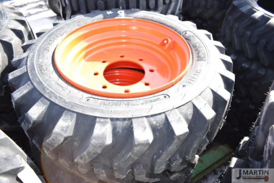 4-Camso 10-16.5 skid loader tires on Bobcat Rims