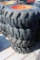 4- Forerunner 12-16.5 skid loader tires w/ Bobcat rims (x4)