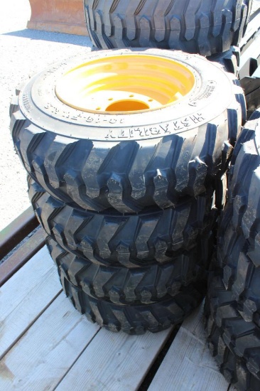 4- Forerunner 10-16.5 skid loader tires w/ cat rims (x4)