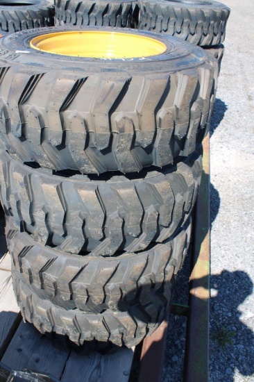 4- Forerunner 12-16.5 skid loader tires w/ cat rims (x4)