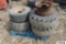 3- 12X16.5 & 1- 11L-15SL skid loader tires on 8 bolt rims w/ spare rim