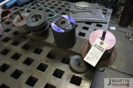 Lot of grinding wheels with wall holder