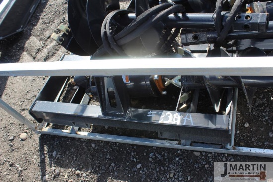 1- Wolverine post hole auger w/ 18" & 12" bits