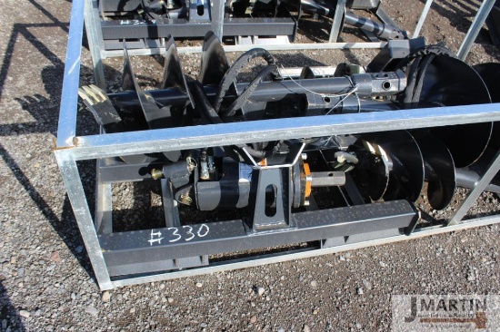 1- Wolverine post hole auger w/ 18" & 12" bits